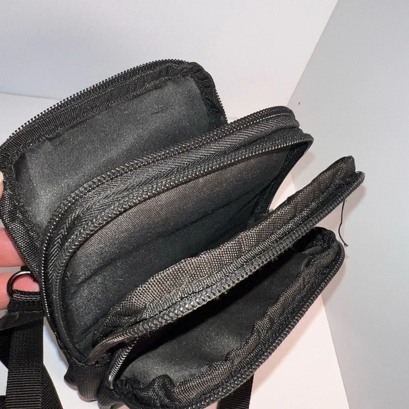 SBS, adjustable, Crossbody, 3 zip compartment, one pouch, belt loop and back 5x8 - Picture 5 of 10